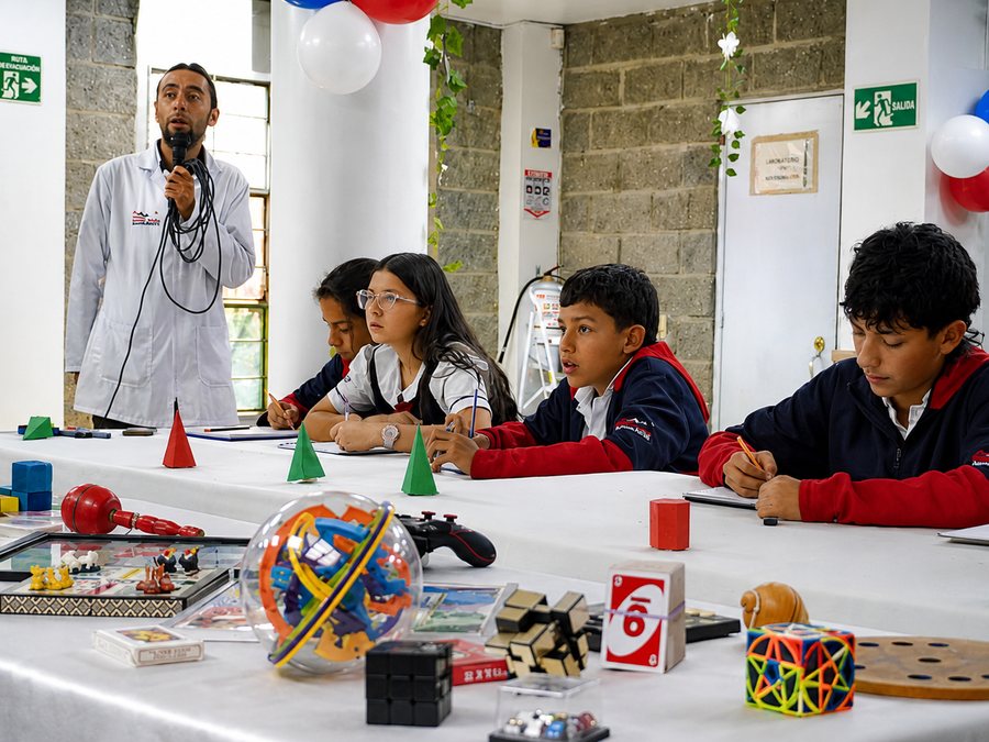 Students explaining a project in class